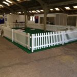 Installing one of three animal arenas at the National Pet Show, Stoneleigh
