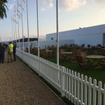 Installation of picket fence and privacy fence to form the entrance to the Rolex Drivers Club at Goodwood Revival
